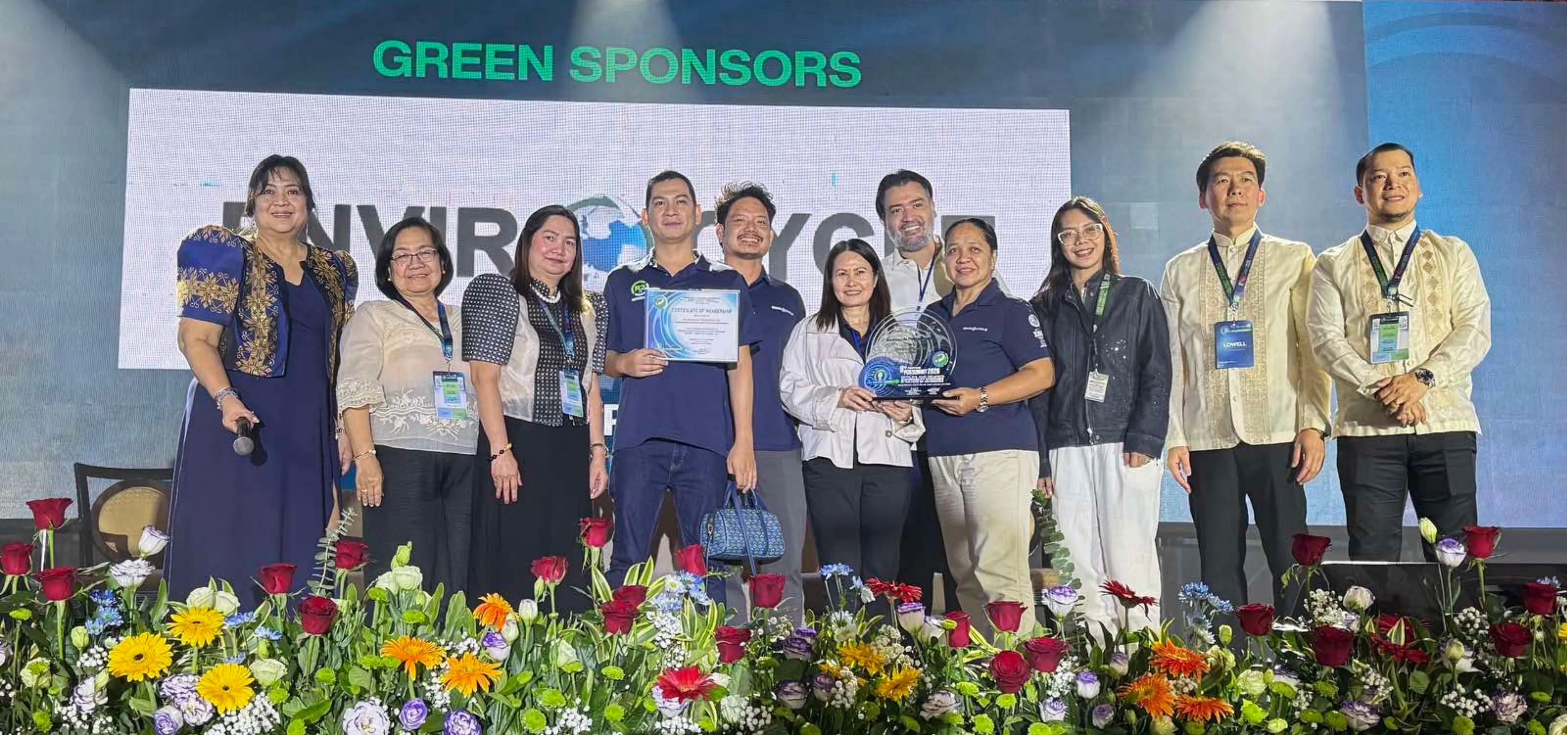 Envirocycle team receiving a certificate and award as Green Sponsors at the 8th PCAPI event
